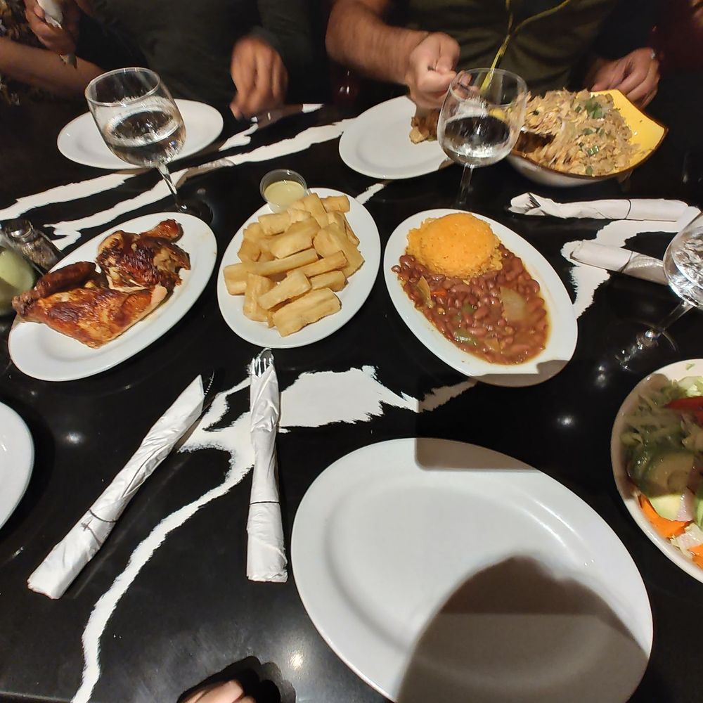 Pio Pio - Salad. Rice and beans. Yucca fries. Chicken thighs. - Latin American Near Me - Glen Cove, New York