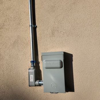 Reedco Electric - The installed plug in with the electrical components. Everything looks clean on my house! - Electricians Near Me