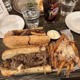 Cheesesteak with fried onions and copper sharp cheese. Side of fries with truffle aioli. 10 out of 10!!! Cheesesteak with fried onions and copper sharp cheese. Side of fries with truffle aioli. 10 out of 10!!!