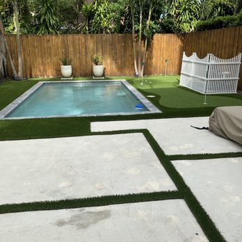 South Florida Putting Greens - a backyard with a pool - Landscaping Near Me