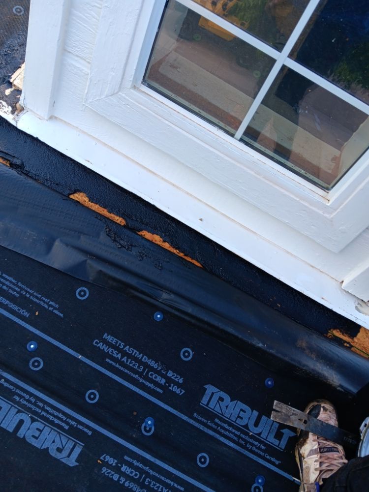 Slide of Real Roofing