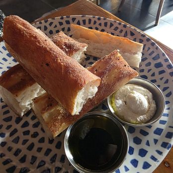 Rose’s Daughter - The house bread is essentially a foccacia; which was crispy yet airy and paired nicely with ricotta, balasmic, and EVOO - Italian Near Me - Delray Beach, Florida