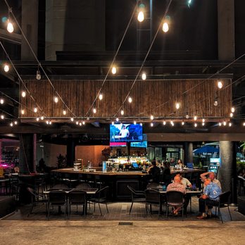 The Row Kaka'ako - The Row Kaka'ako at night - Sports Bars Near Me - Honolulu, Hawaii