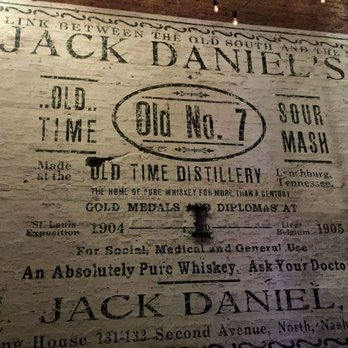 Southern Spirits - jack daniels advertisement on brick wall - Beer, Wine & Spirits Near Me - Fort Mill, South Carolina