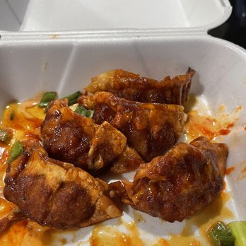 International Flavors - Potstickers; looks burnt but quite soggy. Edges were crispy tho, filling was tasty and sauce was great - Food Trucks Near Me - Stockton, California