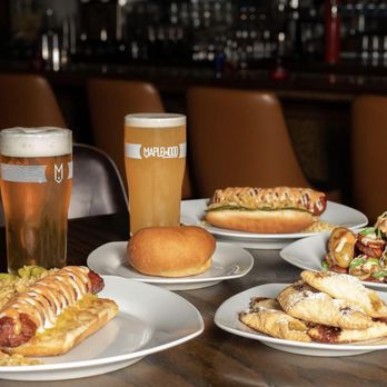 Polombia - Assortment of Kielbasa perro, Kolache, Kolaczki and Sal-CHI-Papa alongside some Maplewood beers - Polish Near Me - Chicago, Illinois