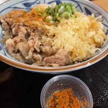 Marugame Udon - Nikutama Udon and chilli spice - Japanese Near Me - Costa Mesa, California Marugame Udon - Nikutama Udon and chilli spice - Japanese Near Me - Costa Mesa, California
