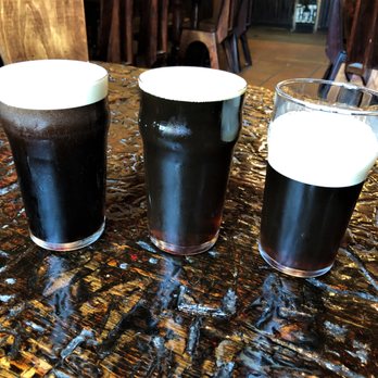 Draught House Pub & Brewery - Nicely poured pints, even someone from the UK would be happy - Brewpubs Near Me - Austin, Texas