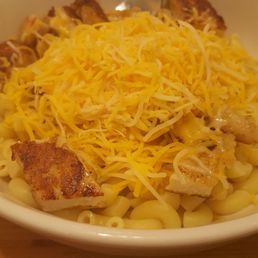Mac and cheese with parmesan crusted chicken. Mac and cheese with parmesan crusted chicken.