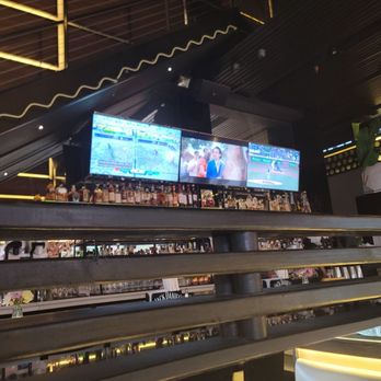 Blend Astoria - Facing the bar (Left to right TVs: Interesting volleyball/futbol hybrid game; Preview of France vs. Morocco; Mets vs. Royals) - Latin American Near Me - Astoria, New York Blend Astoria - Facing the bar (Left to right TVs: Interesting volleyball/futbol hybrid game; Preview of France vs. Morocco; Mets vs. Royals) - Latin American Near Me - Astoria, New York