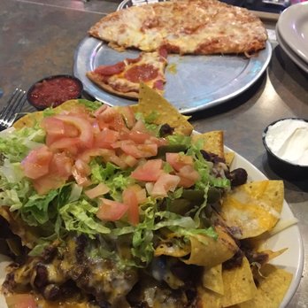 The Orange Lantern - Nachos and bar pie - Sports Bars Near Me - Paramus, New Jersey