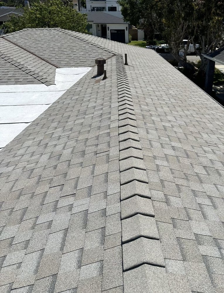 Slide of Alpha Roofing Group