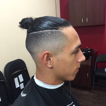 UTB - Bald fade with a man bun style and hard part. - Barbers Near Me - Chino Hills, California UTB - Bald fade with a man bun style and hard part. - Barbers Near Me - Chino Hills, California