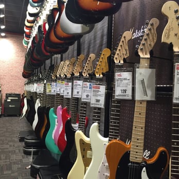 Guitar Center - Rainbow row of gorgeous guitars - Musical Instruments & Teachers Near Me - Mesa, Arizona