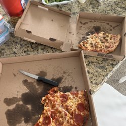 Circle Pizza - Didn't take pictures until we were half way done. Large pepperoni, small sausage pizza and 2 garden salads.