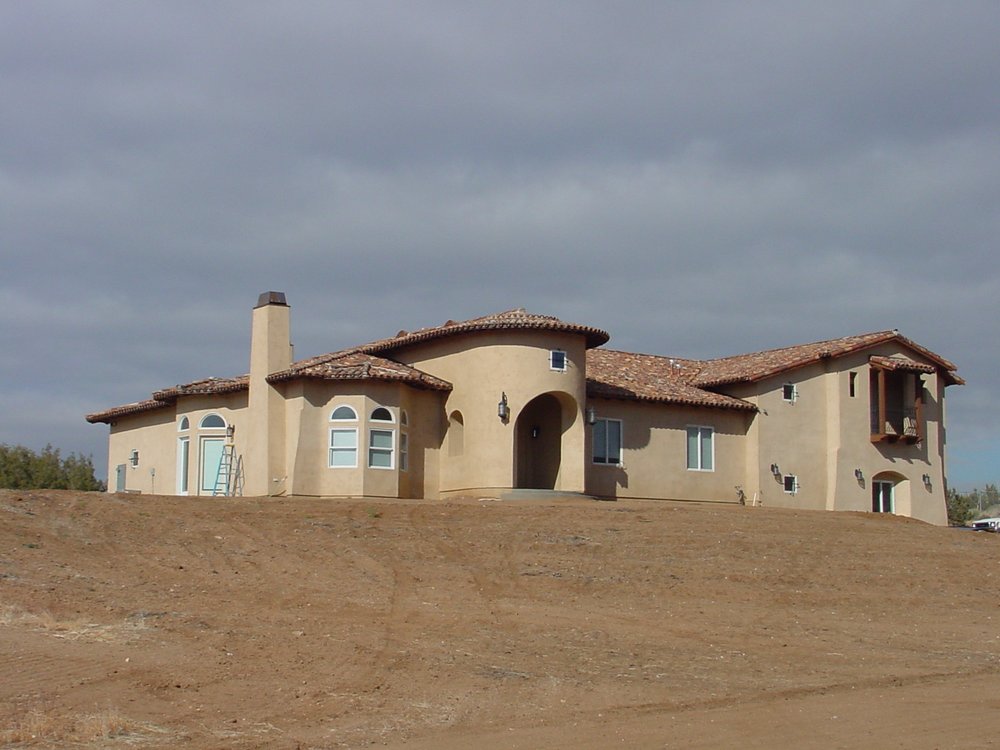 Slide of Valencia Roofing Company