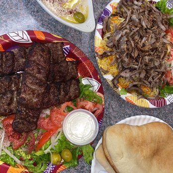 Fattoush Restaurant - Beef kebab plate comes with 4 & beef shawarma plate with rice.. hummus with pita.. that garlic sauce is a MUST! - Middle Eastern Near Me - Lincoln, Nebraska Fattoush Restaurant - Beef kebab plate comes with 4 & beef shawarma plate with rice.. hummus with pita.. that garlic sauce is a MUST! - Middle Eastern Near Me - Lincoln, Nebraska