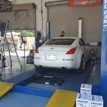 Undercar Specialist - The alignment rack takes a lowered car, but barely. The way the rack works makes alignments really quick. - Auto Repair Near Me - Covina, California Undercar Specialist - The alignment rack takes a lowered car, but barely. The way the rack works makes alignments really quick. - Auto Repair Near Me - Covina, California