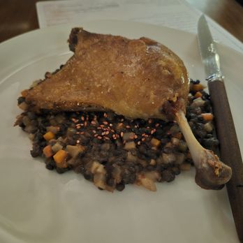 Camelia - duck confit on a bed of lentils and vegetables - French Near Me - Los Angeles, California