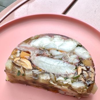 Maison Nico - A slice of Aspic d'Homard en Boullebaise. About 5.5 ounces of lobster, mussels, snapper. - Bakeries Near Me - San Francisco, California Maison Nico - A slice of Aspic d'Homard en Boullebaise. About 5.5 ounces of lobster, mussels, snapper. - Bakeries Near Me - San Francisco, California
