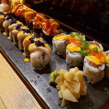 Sen Sushi Bar - Spicy Salmon Maki (Front-Right), Demon Maki (Left), Volcano Maki (Back-Right) - Sushi Bars Near Me - Oak Park, Illinois Sen Sushi Bar - Spicy Salmon Maki (Front-Right), Demon Maki (Left), Volcano Maki (Back-Right) - Sushi Bars Near Me - Oak Park, Illinois