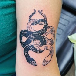 Threshold Body Art Studio - Snakes done by John