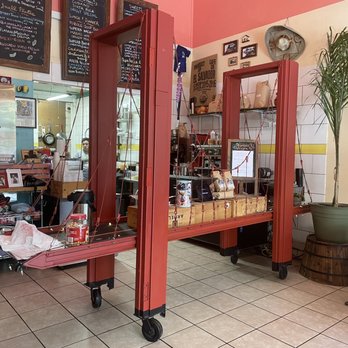 Manitas Cafe - Just realized while waiting for my to-go order that the cashier table is the GG bridge lol (it's even on wheels) - Salvadoran Near Me - San Francisco, California Manitas Cafe - Just realized while waiting for my to-go order that the cashier table is the GG bridge lol (it's even on wheels) - Salvadoran Near Me - San Francisco, California