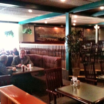 Capri Steak & Pizza House - people sitting at tables - Pizza Near Me - Calgary, Alberta Capri Steak & Pizza House - people sitting at tables - Pizza Near Me - Calgary, Alberta