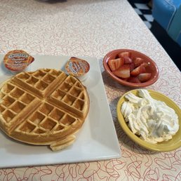 Belgian waffle w/strawberries and whipped cream