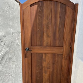 A & H Sullivan Construction - Redwood Arch-top gate with dark oak stain - General Contractors Near Me - San Diego, California A & H Sullivan Construction - Redwood Arch-top gate with dark oak stain - General Contractors Near Me - San Diego, California