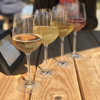 Rose Hill Farm - three glasses of wine on a wooden table - Fruits & Veggies Near Me - Red Hook, New York Rose Hill Farm - three glasses of wine on a wooden table - Fruits & Veggies Near Me - Red Hook, New York