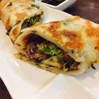 Dumpling Cafe - Inside of roasted beef and scallion pancake - Taiwanese Near Me - Boston, Massachusetts Dumpling Cafe - Inside of roasted beef and scallion pancake - Taiwanese Near Me - Boston, Massachusetts