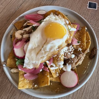 Breezy - My shared order of Adobo Chilequiles.  This picture is a split order. - Breakfast & Brunch Near Me - San Juan Capistrano, California