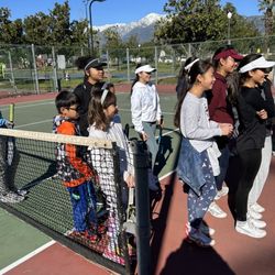 Dave's Tennis Lessons - Celebrating katelyn's birthday on Tennis court as a group we stick together and have fun and cake and ice cream. It was cool. Kaitlyn,
