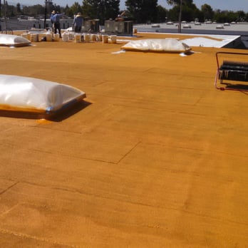 Royal Roof Construction - Royal Roofing OCLA team, applying coating - Roofing Near Me - Placentia, California Royal Roof Construction - Royal Roofing OCLA team, applying coating - Roofing Near Me - Placentia, California