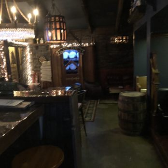 Barrelman's Room - a bar with a television in the background - Cocktail Bars Near Me - Downers Grove, Illinois