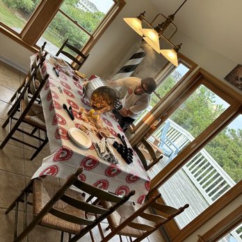 Outer Banks Boil Company - Zach pouring out seafood boil on our table! - Seafood Near Me - Corolla, North Carolina Outer Banks Boil Company - Zach pouring out seafood boil on our table! - Seafood Near Me - Corolla, North Carolina