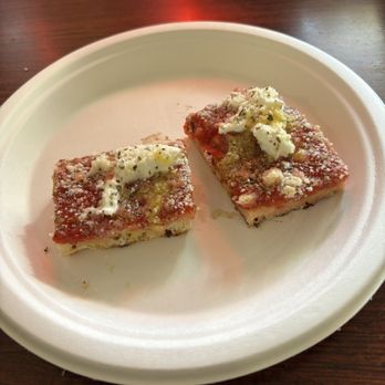 Zazas Pizzeria - Grandma slice special sample - Pizza Near Me - Chicago, Illinois Zazas Pizzeria - Grandma slice special sample - Pizza Near Me - Chicago, Illinois