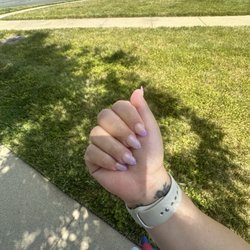 Complex Nail & Spa - Purple tips with flowers on middle and ring finger