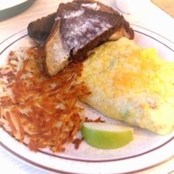 The Guest House Eatery and Pub - Denver Omelet with Rye toast!