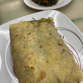 Lucian's Caribbean Grill - Beef Roti & Spinach - Caribbean Near Me - Houston, Texas Lucian's Caribbean Grill - Beef Roti & Spinach - Caribbean Near Me - Houston, Texas