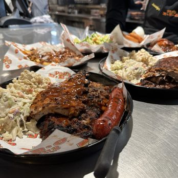 Phil's BBQ - Full rib dinner with Macaroni Salad (Small) and Fresh Cole Slaw (Small) and a Sausage Link - Barbeque Near Me - San Diego, California Phil's BBQ - Full rib dinner with Macaroni Salad (Small) and Fresh Cole Slaw (Small) and a Sausage Link - Barbeque Near Me - San Diego, California