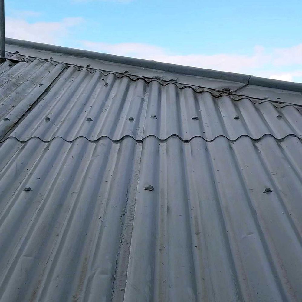 Slide of Liberty City Roofing