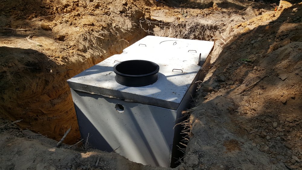 Slide of Wood Septic Tank Company