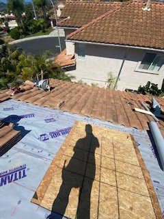 Slide of Courtesy Roofing Services