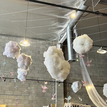 Candle Delirium - Lovely cloud decor with glass hummingbirds. - Candle Stores Near Me - West Hollywood, California