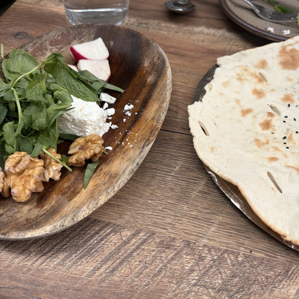 Delbar Middle Eastern - Complimentary bread, feta, walnut, radish and herbs - Persian/Iranian Near Me - Atlanta, Georgia
