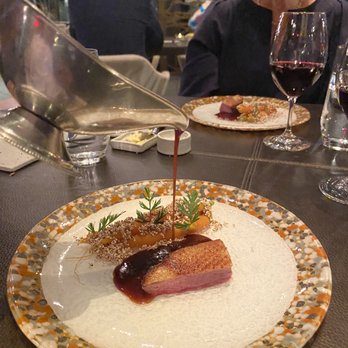 Laurie Raphaël - a plate of food on a table - French Near Me - Quebec City, Quebec Laurie Raphaël - a plate of food on a table - French Near Me - Quebec City, Quebec