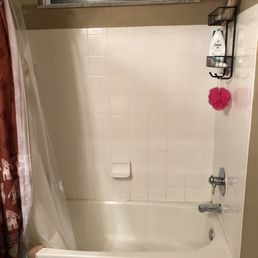 Before - 20 year old miscolored grout and old, loose caulk Before - 20 year old miscolored grout and old, loose caulk
