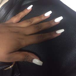 Short coffin shaped nails finished with white powder done by Ethan.   Nails look great!